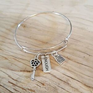 Bracelets by Sandra silver tone adjustable, enough
